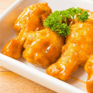 Alitas 12 Pzas Mango con Habanero
