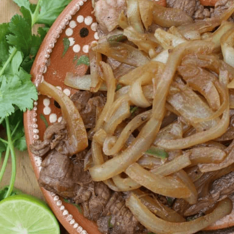 Bistec Encebollado