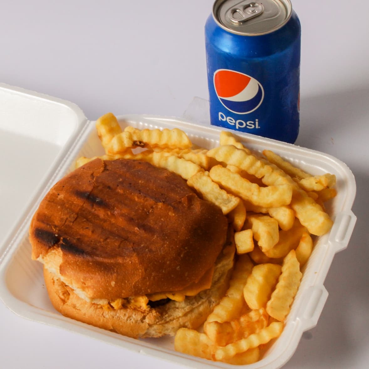 Paquete de hamburguesa sencilla papas y refresco