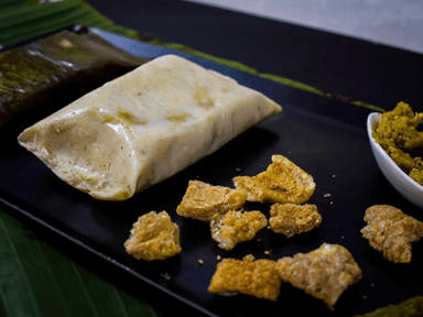 Tamal de Chicharron en Salsa Verde