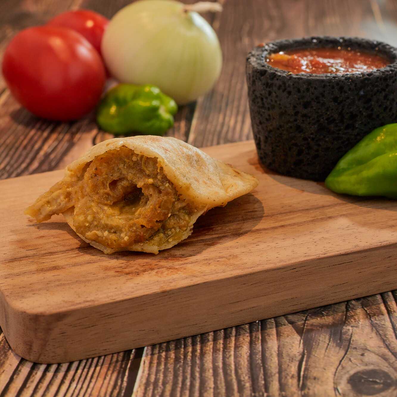 Gordita Chicharrón Guisado en Salsa Verde