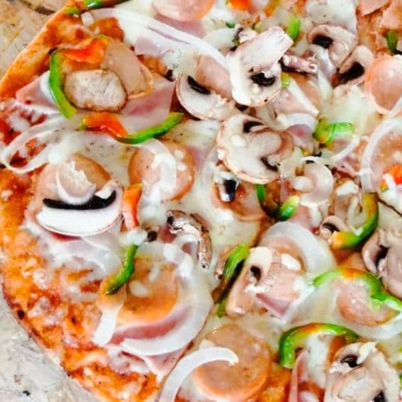 Home pizza mediana (8 porciones)