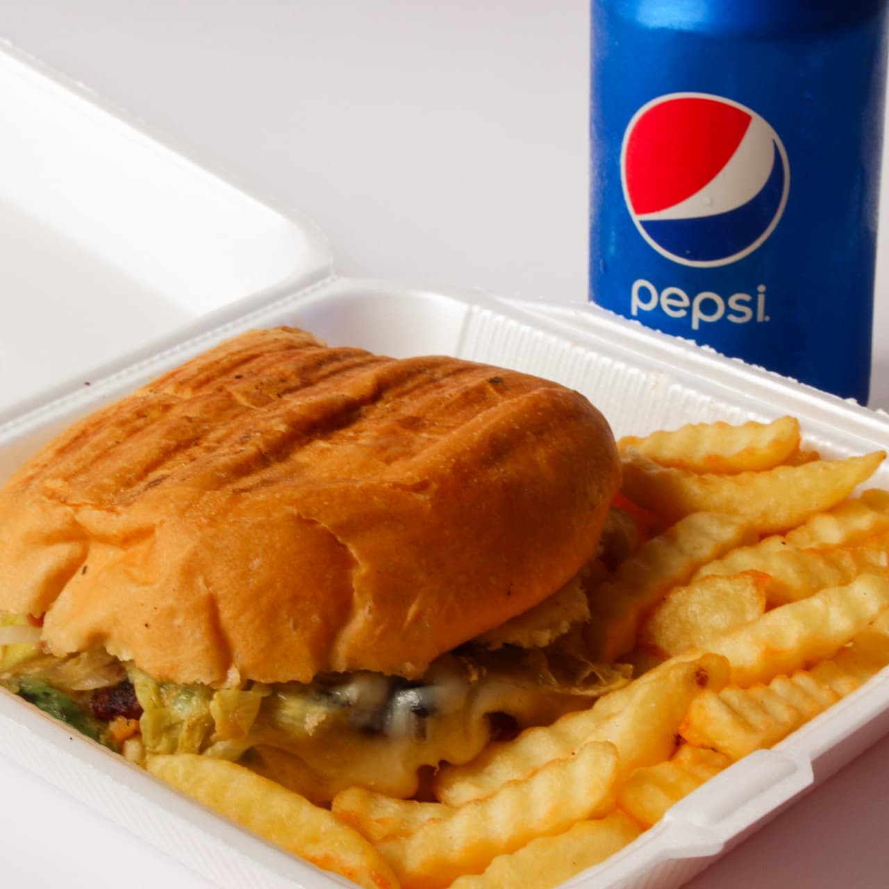 Paquete hamburguesa especial papas y refresco