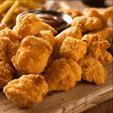 Palomitas de Pollo C/Papas