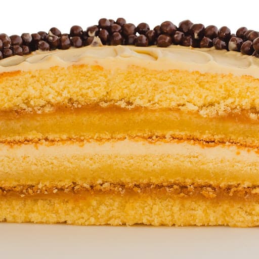 Porción Torta de Arequipe y Avellanas