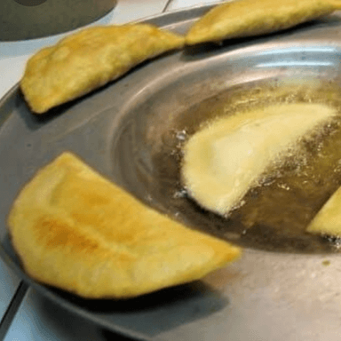 como empanada refresco