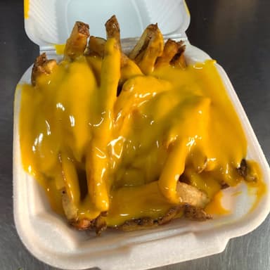 Papas con Queso Cheddar