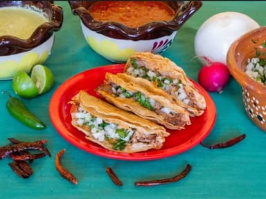 4 tacos de birria dorados + agua del dia
