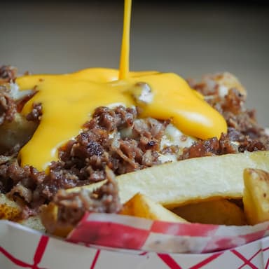 Papas Fritas Con Queso y Carne
