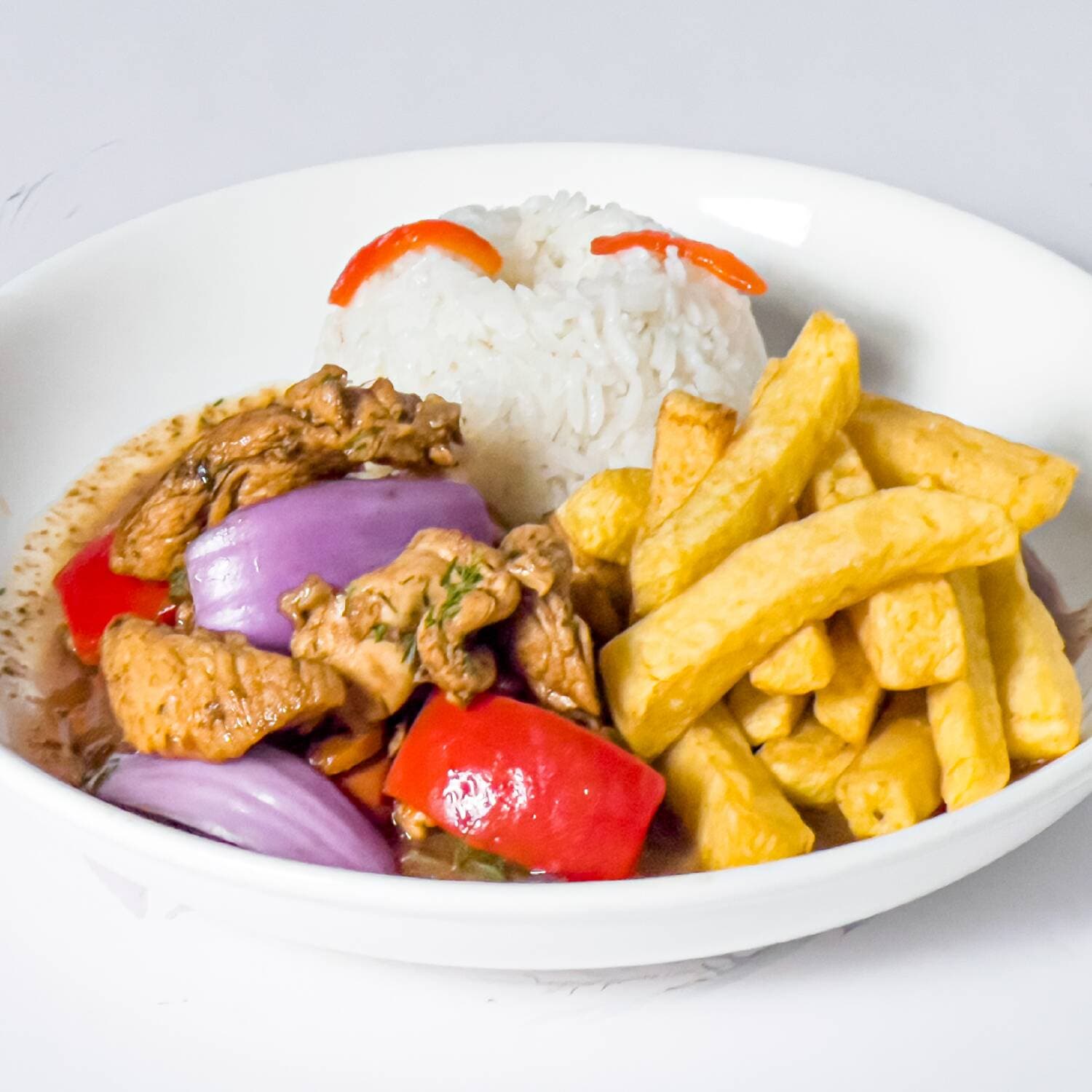 Saltado de Pollo