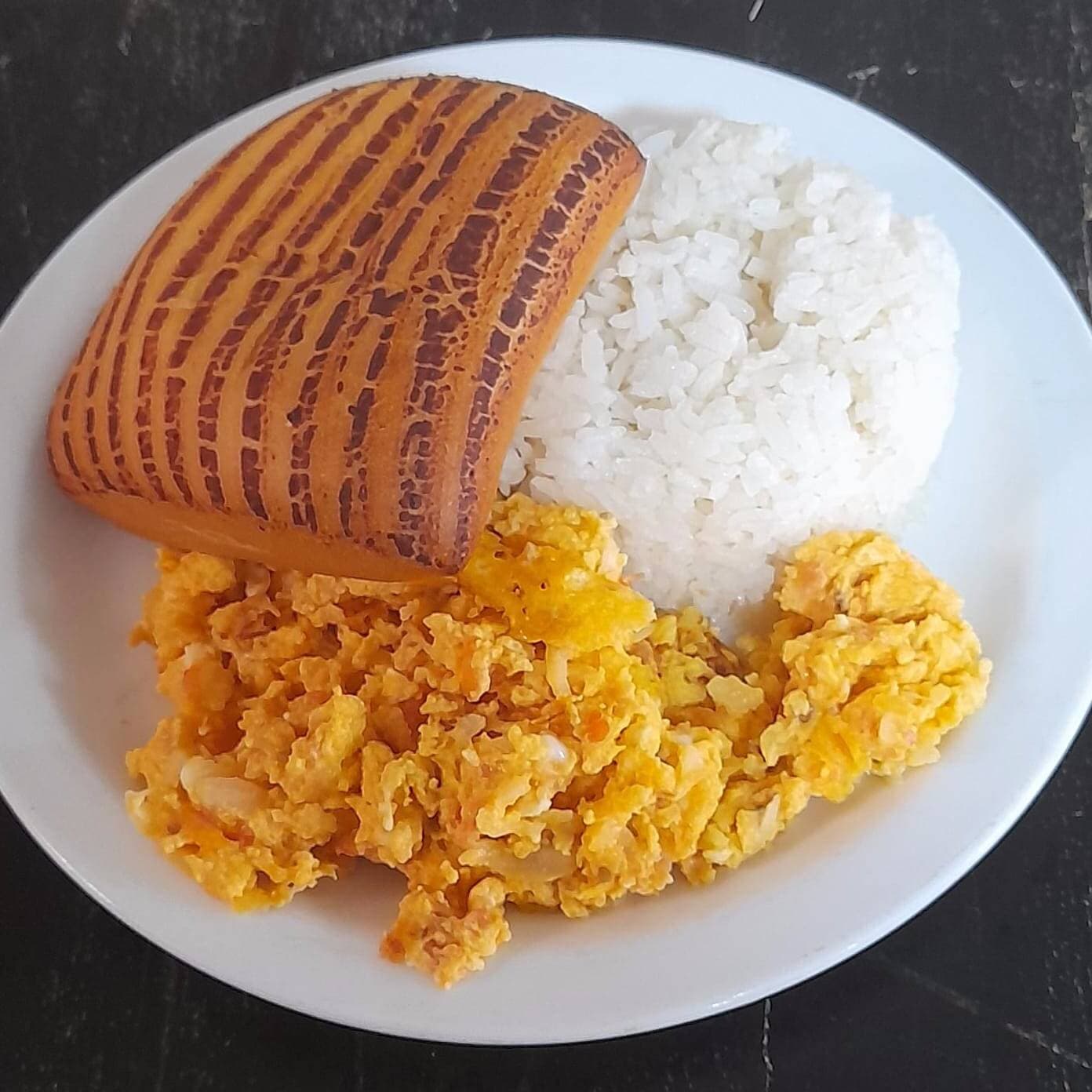 Huevos al Gusto con Arroz