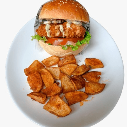 Hamburguesa de Pollo Apanado + Papas + Cocacola