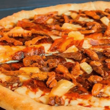 Una Pizza Grande de Carne al Pastor.