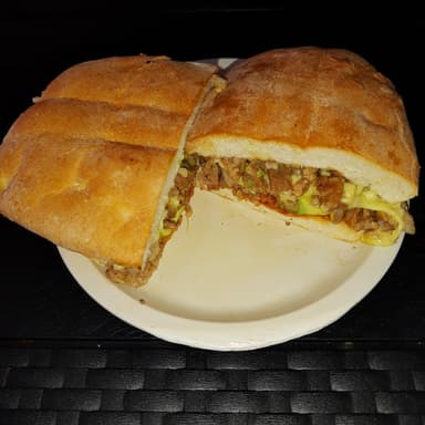 2 tortas de pastor con queso