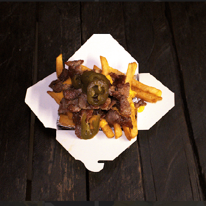 Papas fritas con carne asada