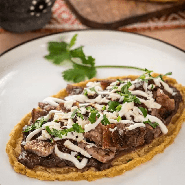 2 HUA.MILANESA CON QUESO  +2 AGUAS HORCHTA GRATIS