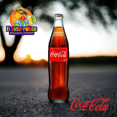Coca-Cola ½ Lt Vidrio Con Envase Incluido