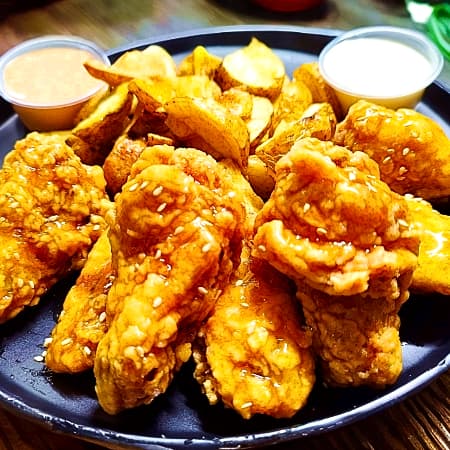 Alitas Maracuyá 6und+papas Nativas