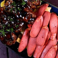Alitas bbq Con salchipapas