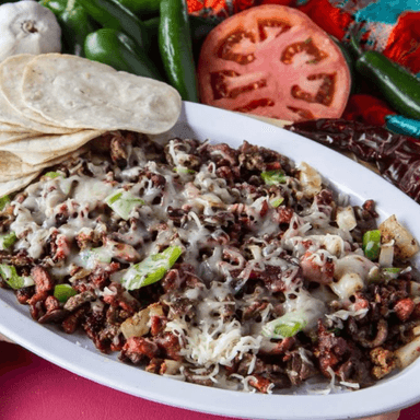 Mitla - Bistec, tocino, chuleta, pastor y queso