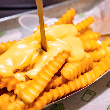 Papas con Queso Cheddar