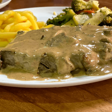 Lomito en Salsa de Hongos