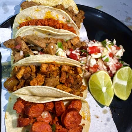 4 Tacos de Cerdo + Chiva Cola