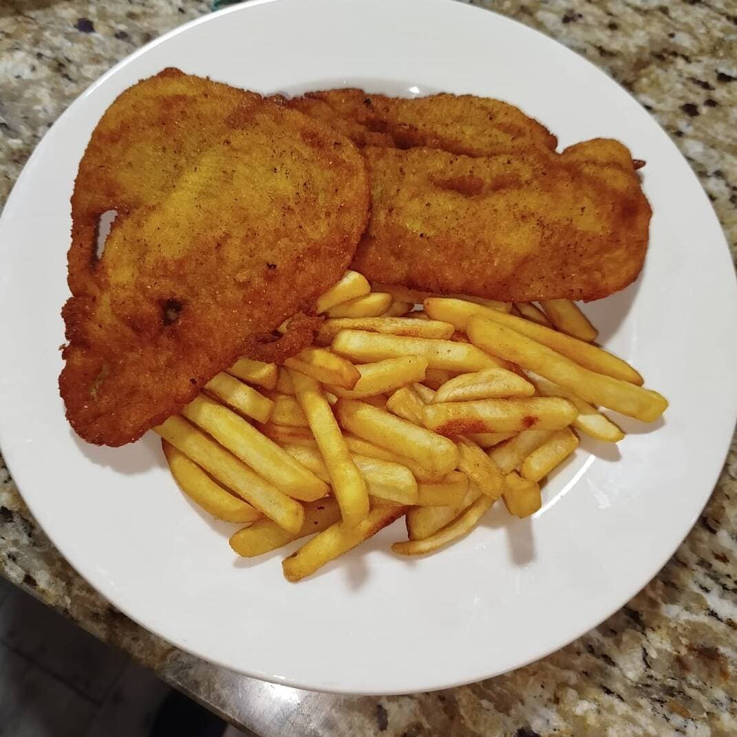 2 Porciones de Chuleta de Pollo y Papa