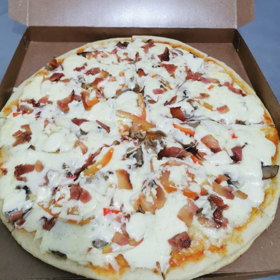Pizza Personal 4 porciones mixta