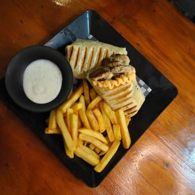 Wrap de cerdo + porción de papas