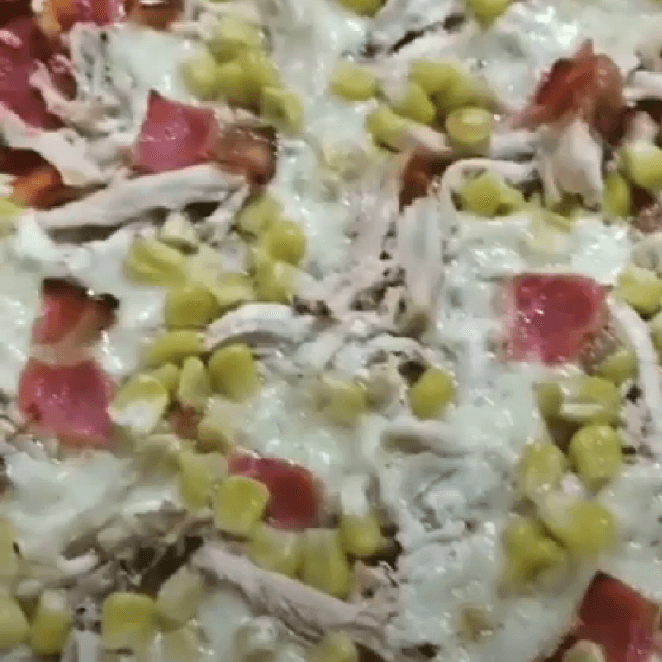 Pizza  tocineta y maiz mediana