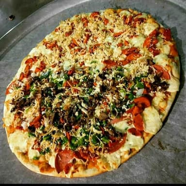 Pizza Large Pollo y Butifarra