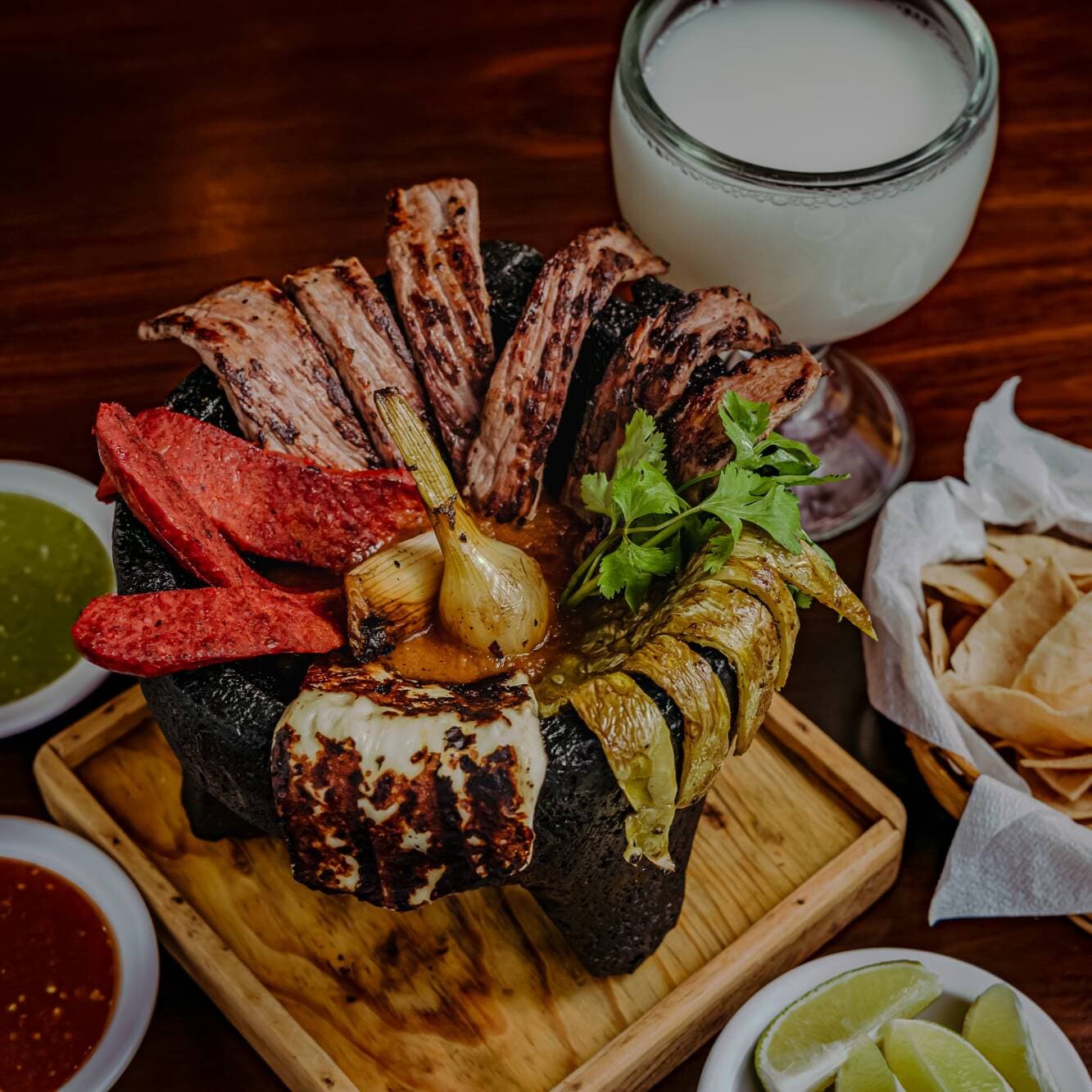 PAQUETE MOLCAJETE DE ARRACHERA + 1 AGUA FRESCA (50
