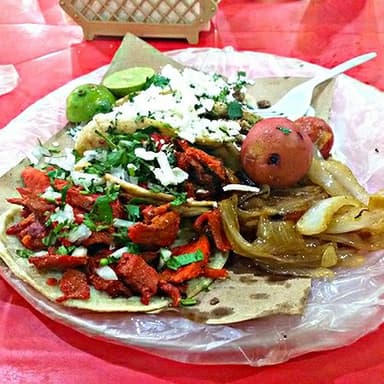 Orden 4 tacos de Trompo