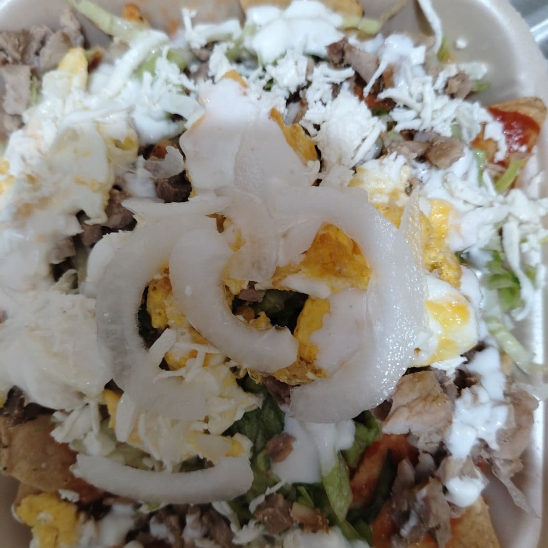 Chilaquiles Rojos Asada/Huevo Revuelto