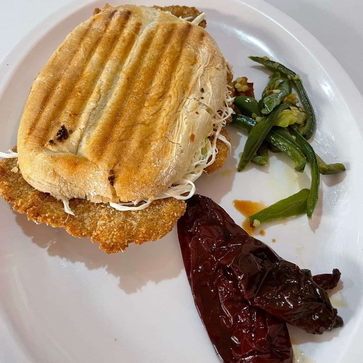 Torta planchada de milanesa de pollo