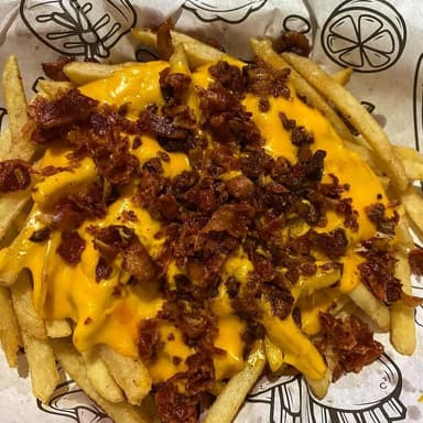 Ord. de Papas Francesas, Queso y Tocino