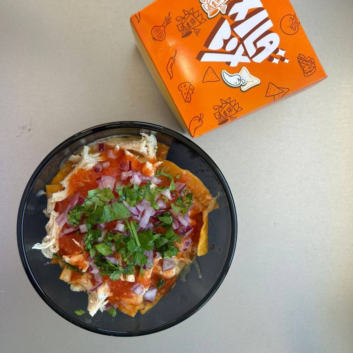 Chilaquiles con Chicharrón de la Ramos