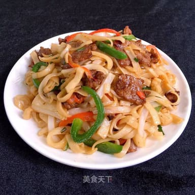 32.Fideos de Arroz Seco con Carne de Res