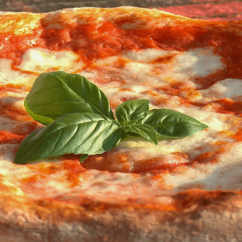 Promo Pizza Primavera 8 tajadas y pan al ajo
