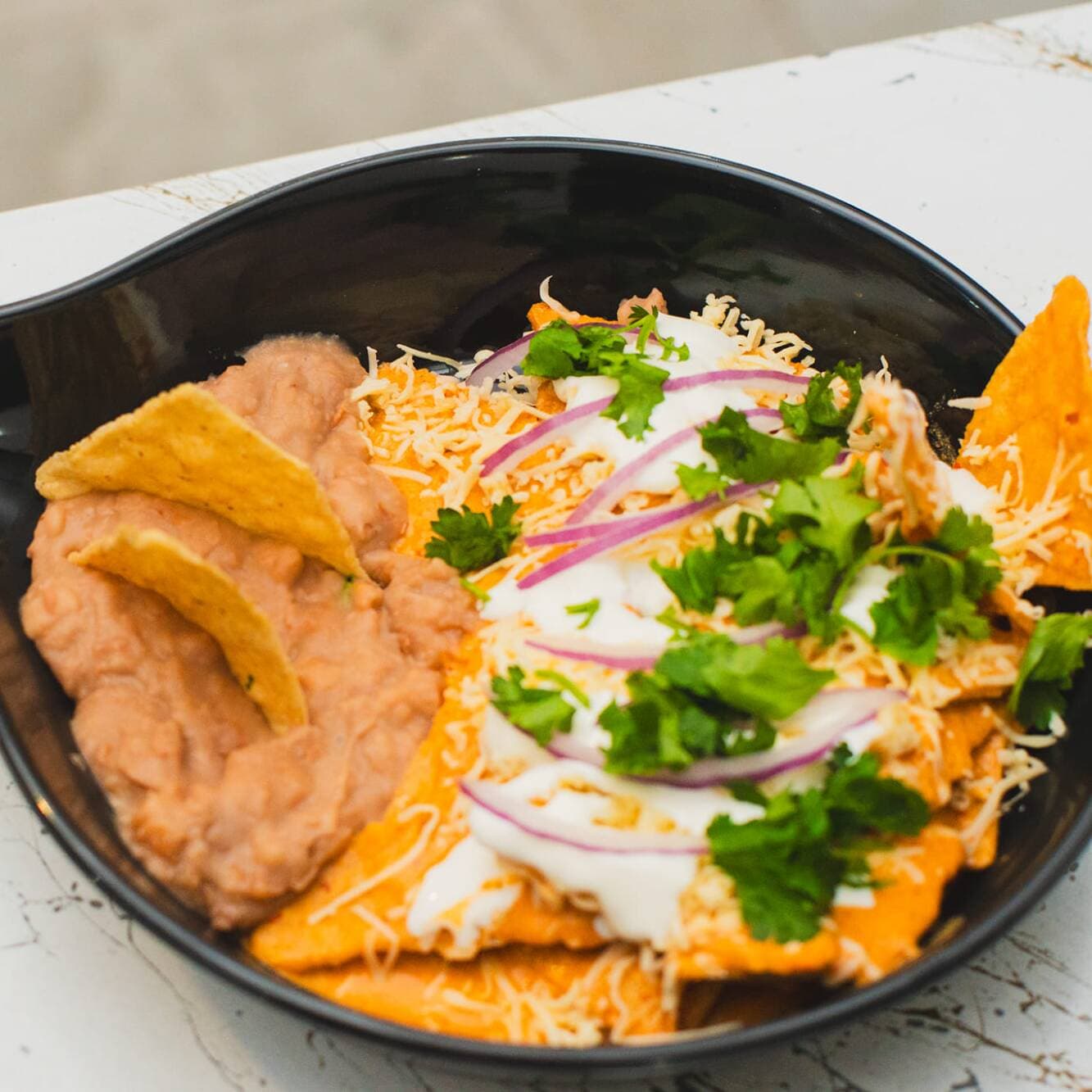chilaquiles naturales / jugo de naranja