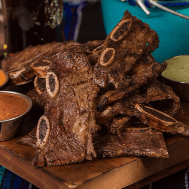 1/2 Kilo de Costilla+Guarnicion+Bebida