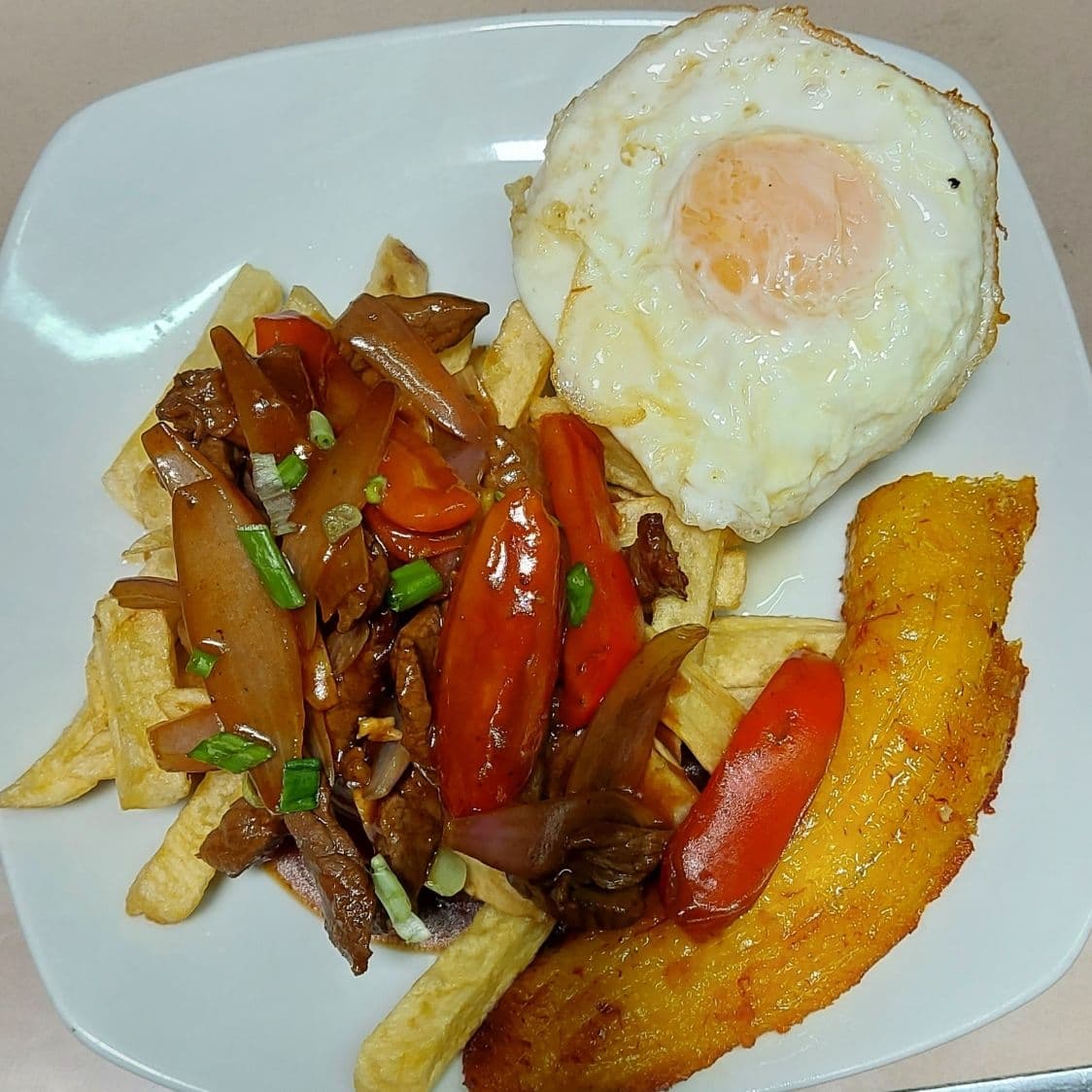 Lomo Saltado más PEPSI