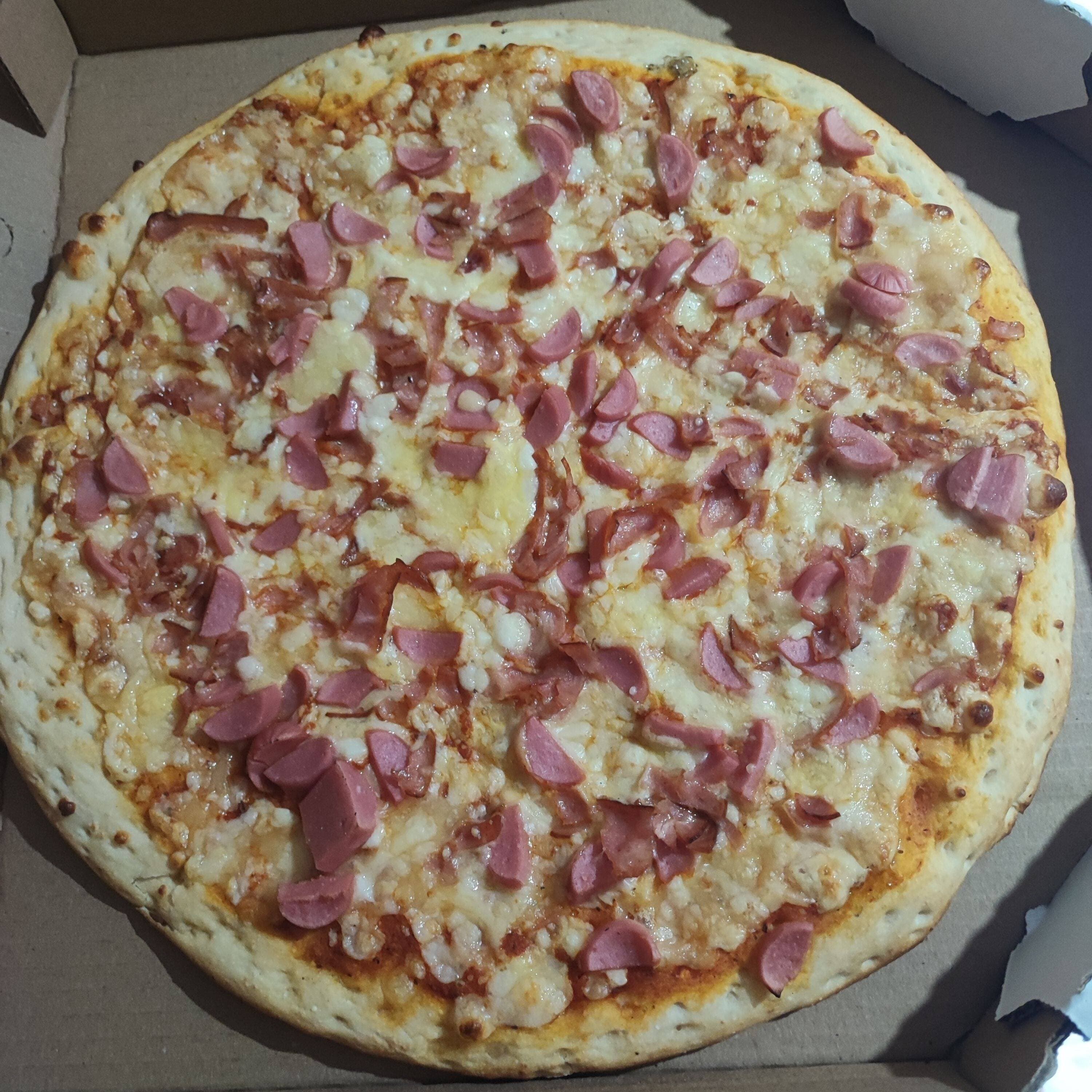 Pizza Badger grande 35 cm 8 rebanadas