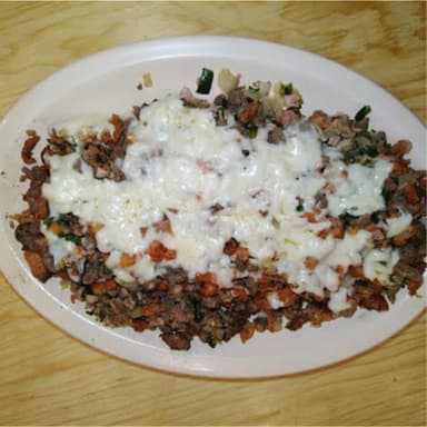 ESPECIAL PASTOR (CON QUESO, TOCINO, JAMON, CHILE POBLANO Y CEBOL
