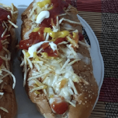 2 Perros Calientes + Coca Cola 355ml