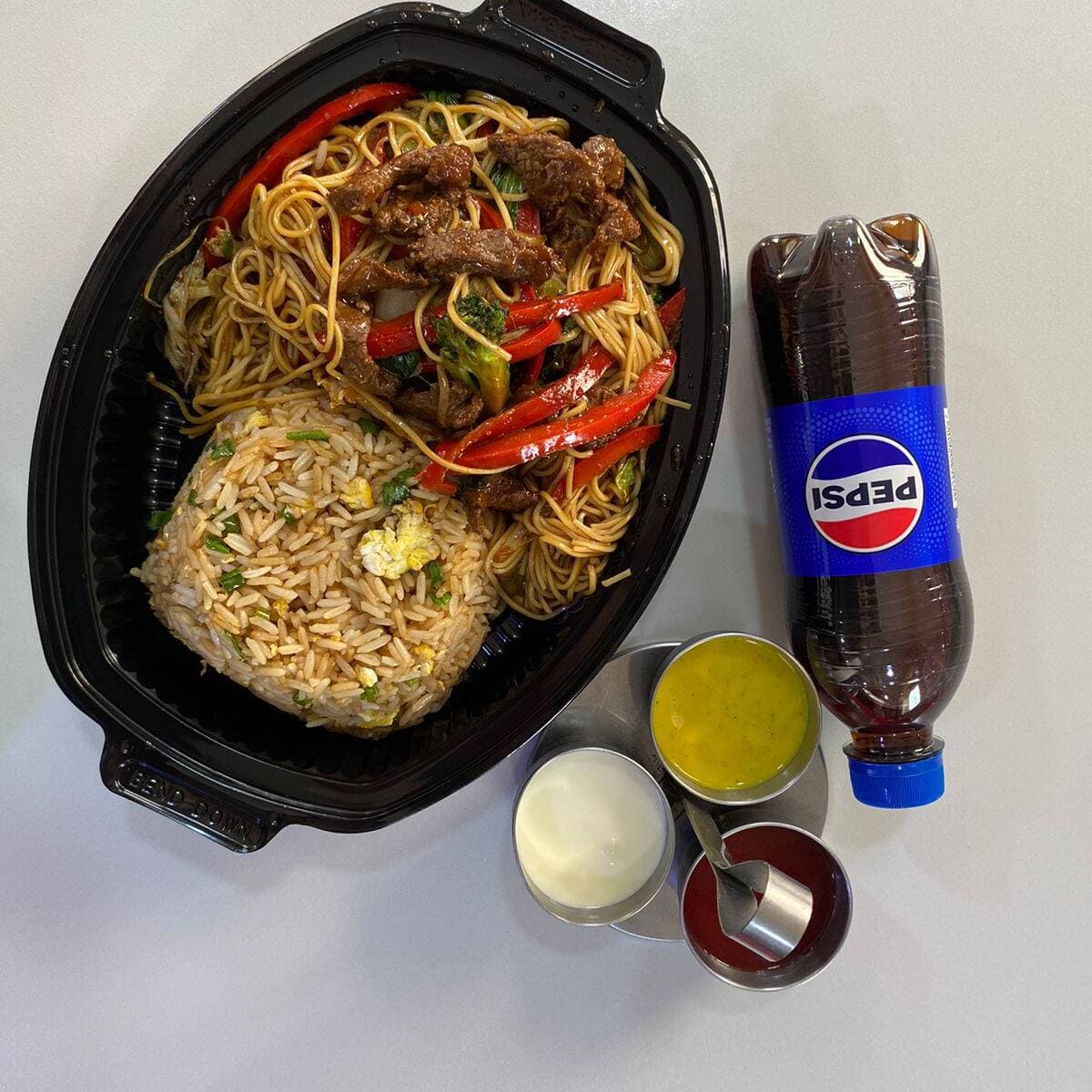 Combinado de carne más Pepsi