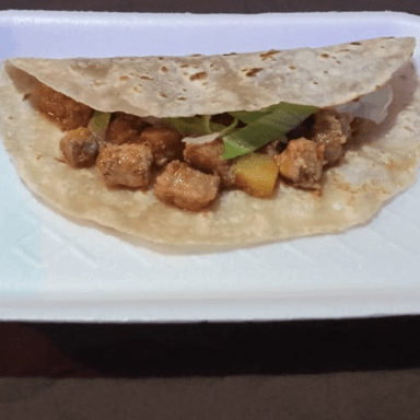 Taco de Harina de Puerco en Salsa