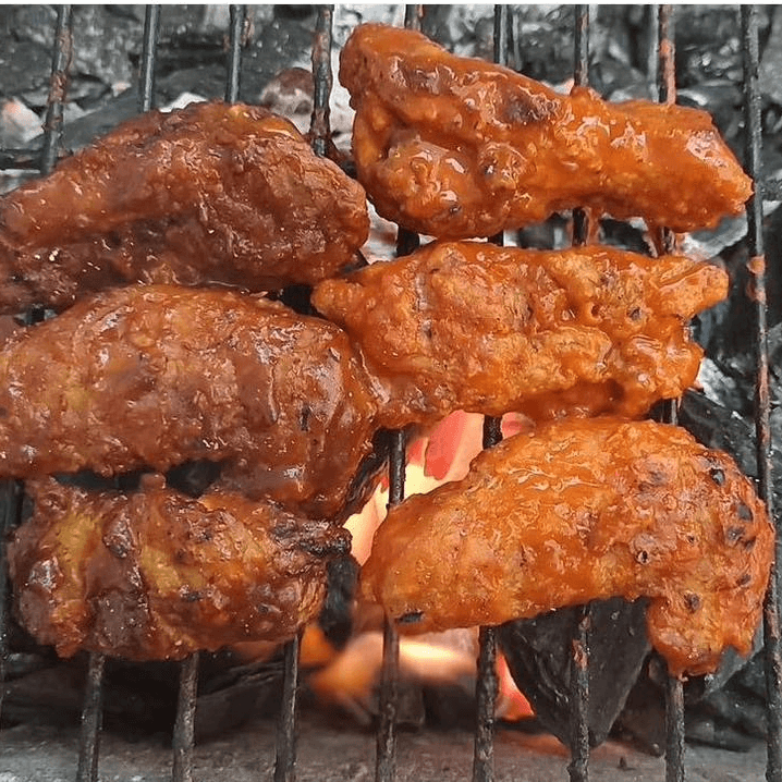Alitas + 1/2 Orden de Papas