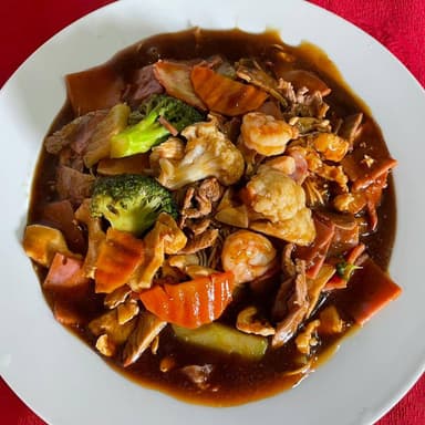 Entero de Arroz en Salsa Especial de la Casa